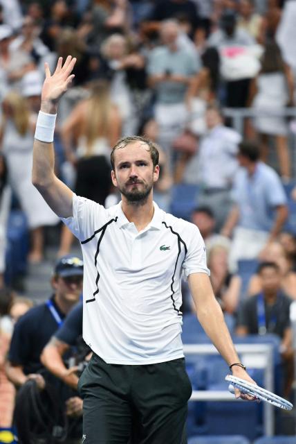 Russia's Daniil Medvedev celebrates defeating France's Hugo Gaston in their men's singles first round tennis match on day one of the US Open tennis tournament at the USTA Billie Jean King National Tennis Center in New York on August 30, 2026. (Photo by ANGELA WEISS / AFP)