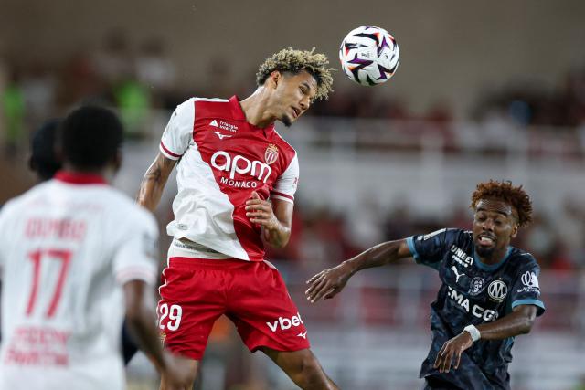 Monaco's German forward #29 Paris Brunner heads the ball during the French L1 football match between AS Monaco and Olympique de Marseille (OM) at the Stade Louis II in the Principality of Monaco on August 30, 2026. (Photo by Valery HACHE / AFP)
