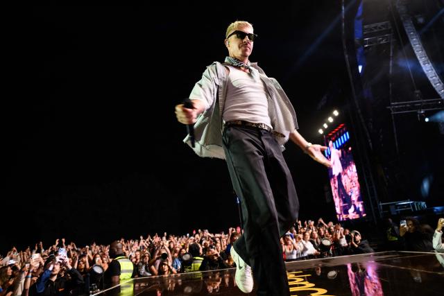 US rapper, singer, dancer and DJ, Benjamin Haggerty, known as Macklemore, performs at the Goldencoast Rap Festival in Corcelles-les-Monts, near Dijon, central-eastern France, on August 30, 2026. (Photo by ARNAUD FINISTRE / AFP)