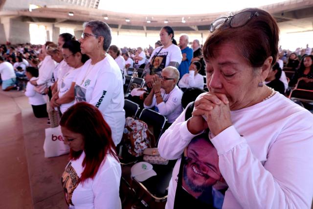 People attend a mass to mark the International Day of the Victims of Enforced Disappearances in Guadalajara, Jalisco state, Mexico on August 30, 2026. (Photo by ULISES RUIZ / AFP)