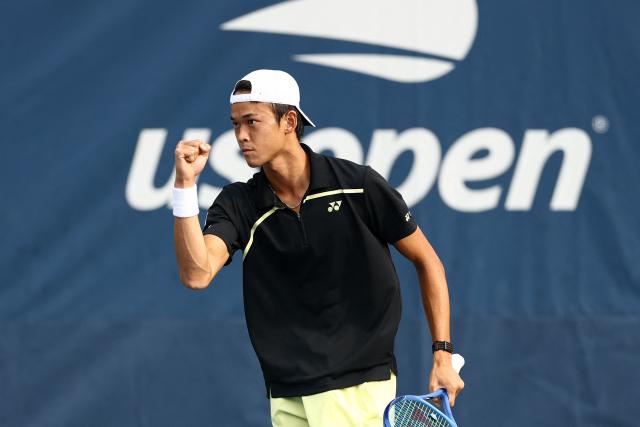 Japan's Rei Sakamoto reacts as he plays Australia's Aleksandar Vukic during their men's singles first round tennis match on day one of the US Open tennis tournament at the USTA Billie Jean King National Tennis Center in New York on August 30, 2026. (Photo by CHARLY TRIBALLEAU / AFP)