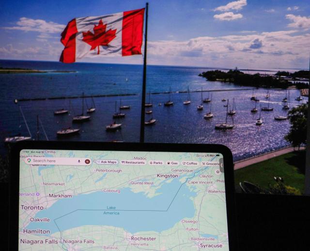 (ILLUSTRATION)This photo illustration dated August 30, 2026 shows a Google map identifying Lake Ontario as "Lake America" in front of a photograph taken on August 27 of the Canadian flag flying over the lake in Toronto, Ontario. Google redesignated Lake Ontario as "Lake America" on maps seen by US users on August 30, 2026 after President Donald Trump announced he was renaming the body of water, with a Canadian official slamming the cross-border tensions as "absolutely backwards." People in Canada will still see the body of water labeled Lake Ontario, the Indigenous-rooted name used since the 17th century, on their devices and computers, the US-based tech giant said. (Photo by Nicholas KAMM / AFP)