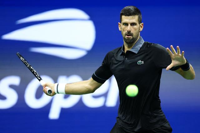 Serbia's Novak Djokovic returns a shot against Argentina's Mariano Navone during the men's singles first round tennis match on day one of the US Open tennis tournament at the USTA Billie Jean King National Tennis Center in New York City on August 30, 2026. (Photo by CHARLY TRIBALLEAU / AFP)