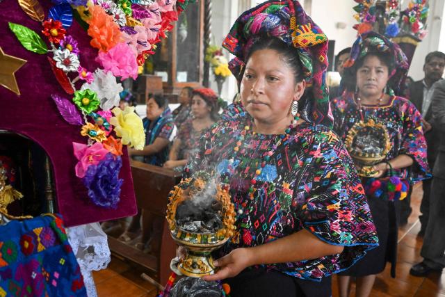 An indigenous woman attends a catholic procession to ask for rain amid a prolonged drought in Santo Domingo Xenacoj, Guatemala on August 30, 2026. (Photo by Johan ORDONEZ / AFP)