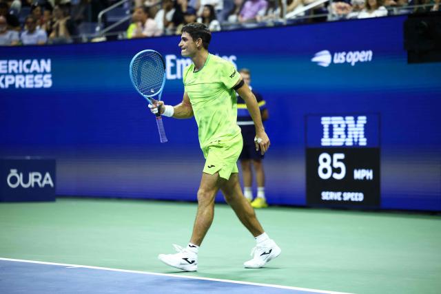 Argentina's Mariano Navone reacts during a match against Serbia's Novak Djokovic during the men's singles first round tennis match on day one of the US Open tennis tournament at the USTA Billie Jean King National Tennis Center in New York City on August 30, 2026. (Photo by CHARLY TRIBALLEAU / AFP)