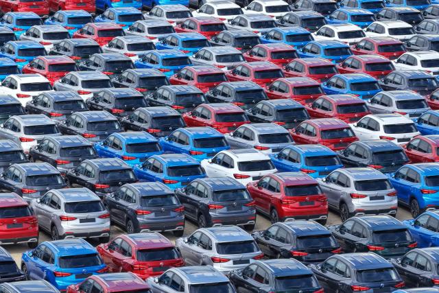 Chinese-made MG ZS vehicles, produced by SAIC Motor, are parked at a vehicle storage yard awaiting shipment for export in Yantai, in eastern China's Shandong province, on August 31, 2026. (Photo by CN-STR / AFP) / China OUT