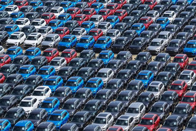 Chinese-made MG ZS vehicles, produced by SAIC Motor, are parked at a vehicle storage yard awaiting shipment for export in Yantai, in eastern China's Shandong province, on August 31, 2026. (Photo by CN-STR / AFP) / China OUT
