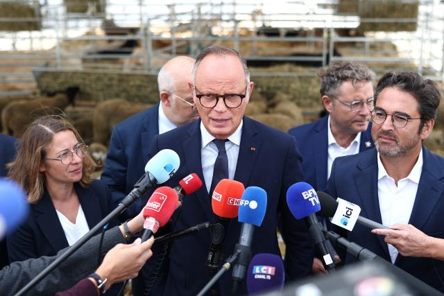 Candidate for France’s 2027 presidential election for the right-wing Horizons party and Mayor of Le Havre Edouard Philippe speaks to press during his visit to the agricultural fair in Chвlons-en-Champagne, northeastern France on August 31, 2026. (Photo by Sameer AL-DOUMY / AFP)