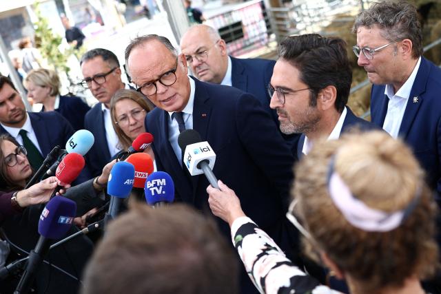 Candidate for France’s 2027 presidential election for the right-wing Horizons party and Mayor of Le Havre Edouard Philippe speaks to press during his visit to the agricultural fair in Chвlons-en-Champagne, northeastern France on August 31, 2026. (Photo by Sameer AL-DOUMY / AFP)