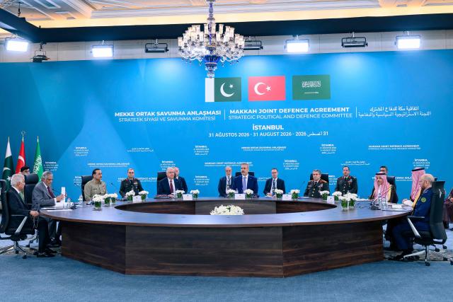 Turkey's Foreign Minister Hakan Fidan (C), Pakistan's Foreign Minister Ishaq Dar (2nd L) and Saudi Arabia's Defence Minister Khalid Bin Salman (3rd R) attend the inaugural meeting of the Strategic Political and Defence Committee established under the Strategic Mutual Defense Agreement (SMDA) between the three countries, in Istanbul on August 31, 2026. (Photo by Yasin AKGUL / AFP)