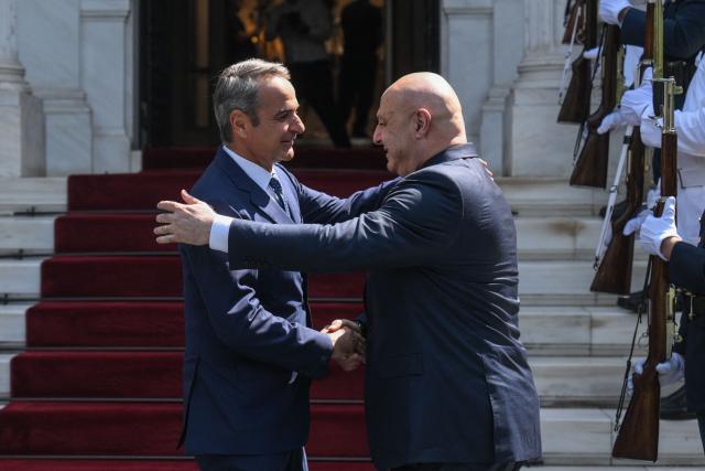 Greek Prime Minister Kyriakos Mitsotakis (L) welcomes Lebanese President Joseph Aoun (R) prior their meeting at the Maximos Mansion in Athens, on August 31, 2026. (Photo by Angelos TZORTZINIS / AFP)