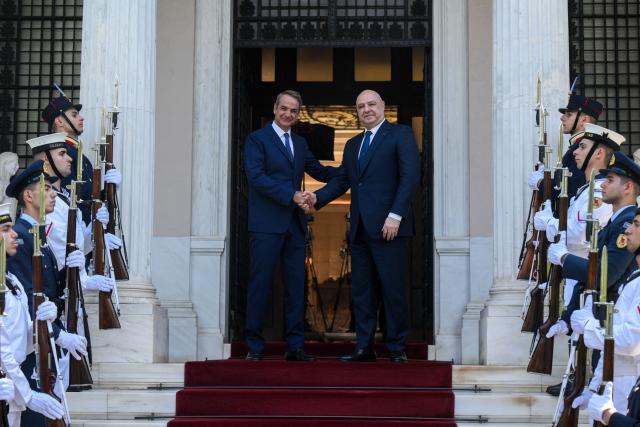 Greek Prime Minister Kyriakos Mitsotakis (L) shakes hands with Lebanese President Joseph Aoun (R) prior their meeting at the Maximos Mansion in Athens, on August 31, 2026. (Photo by Angelos TZORTZINIS / AFP)