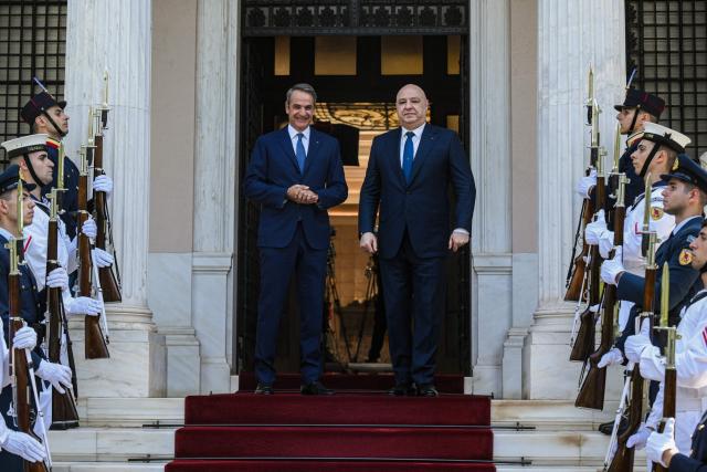 Greek Prime Minister Kyriakos Mitsotakis (L) welcomes Lebanese President Joseph Aoun (R) prior their meeting at the Maximos Mansion in Athens, on August 31, 2026. (Photo by Angelos TZORTZINIS / AFP)
