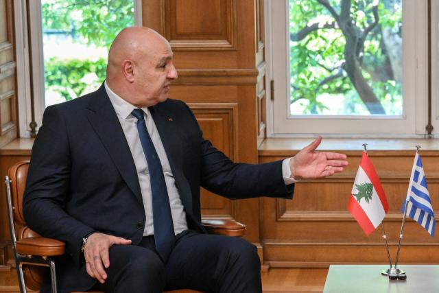 Lebanese President Joseph Aoun (L) speaks with Greek Prime Minister (not pictured) during their meeting at the Maximos Mansion in Athens, on August 31, 2026. (Photo by Angelos TZORTZINIS / AFP)