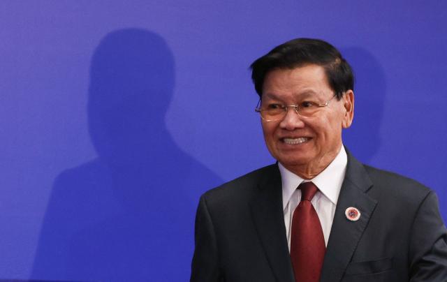In this pool photograph distributed by the Russian state agency Sputnik, Laotian President Thongloun Sisoulith arrives to attend the opening ceremony of the 6th World Nomad Games at the Bishkek Arena in Bishkek on August 31, 2026. (Photo by Vyacheslav PROKOFYEV / POOL / AFP)