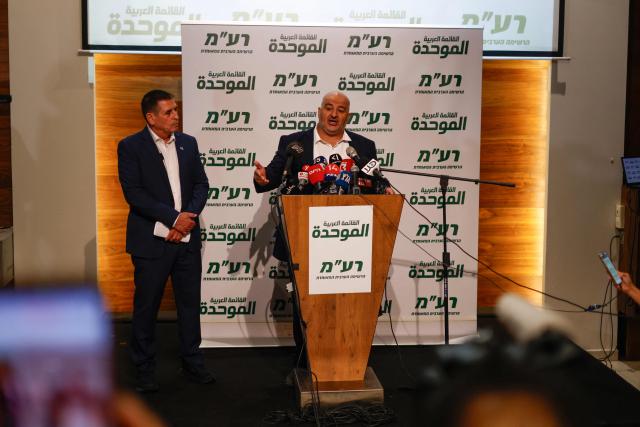 Leader of the Arab Israeli party Ra'am (United Arab List) Mansour Abbas (R) and Israeli politician Yoav Segalovitz attend a news conference in Nazareth on August 31, 2026. Abbas announced that Segalovitz, an Israeli Jew, will join his party for the upcoming Israeli elections. (Photo by Jalaa MAREY / AFP)