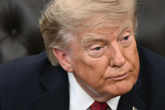 US President Donald Trump looks on during an announcement on Healthcare Affordability in the Oval Office of the White House in Washington, DC, on August 31, 2026. (Photo by Brendan SMIALOWSKI / AFP)