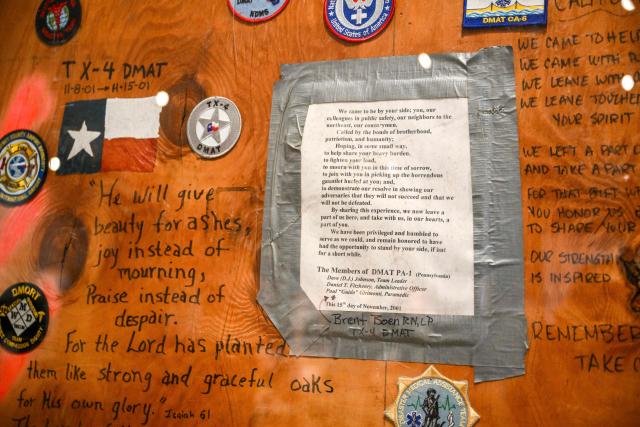 An exhibit is seen at a press preview of the 9/11 Memorial & Museum’s exhibition, “In Their Honor: 25 Years of 9/11 Inspired Service”, exploring the legacy of service inspired by September 11, 2001, in New York, on August 31, 2026. September 11, 2026 will mark the 25th anniversary of the September 11, 2001 attacks. (Photo by ANGELA WEISS / AFP)