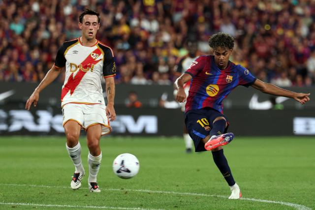 Barcelona's Spanish forward #10 Lamine Yamal scores his team's fifth goal during the Spanish league football match between FC Barcelona and Rayo Vallecano de Madrid at Camp Nou Stadium in Barcelona on August 31, 2026. (Photo by Lluis GENE / AFP)