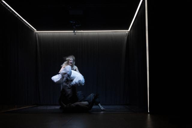 Actor Darya Legeyda, who plays Penelope, performs on stage during a rehearsal of "Odyssey. Maeotis", a theatrical adaptation of Homer’s "Odyssey" by Ukraine’s Azov military corps, at the Ivan Franko Theatre in Kyiv on August 24, 2026, amid the Russian invasion of Ukraine. The longing for home at the heart of Homer's Odyssey resonates in Ukraine, where Russia's invasion has displaced millions and sent hundreds of thousands to fight, with tens of thousands still missing or held captive.  While the epic has found audiences worldwide with Christopher Nolan's blockbuster, Kyiv has staged its adaptation: a collaboration between the Ivan Franko Theatre and the Azov military corps. (Photo by Roman PILIPEY / AFP)