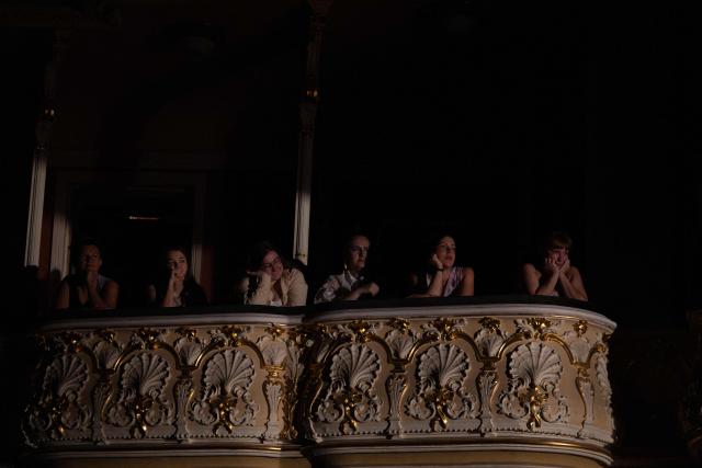Spectators watch "Odyssey. Maeotis", a theatrical adaptation of Homer’s "Odyssey" by Ukraine’s Azov military corps, at the Ivan Franko Theatre in Kyiv on August 28, 2026, amid the Russian invasion of Ukraine. The longing for home at the heart of Homer's Odyssey resonates in Ukraine, where Russia's invasion has displaced millions and sent hundreds of thousands to fight, with tens of thousands still missing or held captive.  While the epic has found audiences worldwide with Christopher Nolan's blockbuster, Kyiv has staged its adaptation: a collaboration between the Ivan Franko Theatre and the Azov military corps. (Photo by Serhii Okunev / AFP)