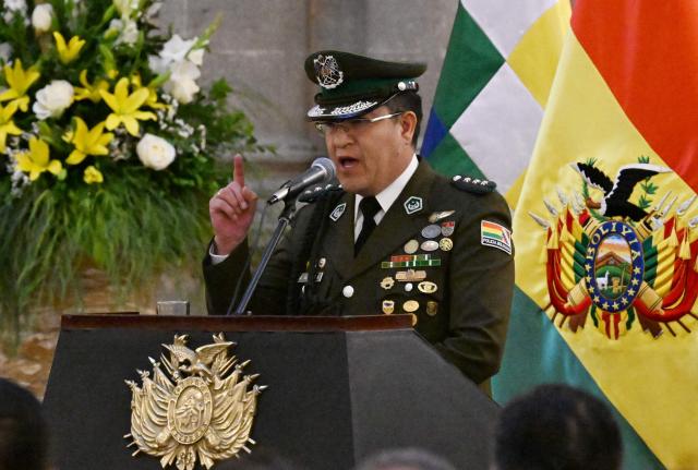 Bolivian Police Colonel Adrian Javier Alvarez speaks after being sworn in as the new interim Commander-in-chief of the Bolivian Police, following the resignation of Mirko Sokol at the Government Palace in La Paz on August 31, 2026. (Photo by Aizar RALDES / AFP)