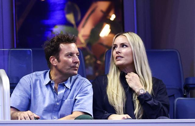 US actor and TV host Jimmy Fallon and US alpine skier Lindsey Vonn attend the men's singles first round tennis match between USA's Ben Shelton and Netherlands' Tallon Griekspoor on day two of the US Open tennis tournament at the USTA Billie Jean King National Tennis Center in New York City on August 31, 2026. (Photo by CHARLY TRIBALLEAU / AFP)