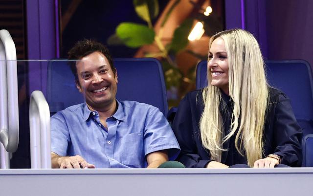 US actor and TV host Jimmy Fallon and US alpine skier Lindsey Vonn attend the men's singles first round tennis match between USA's Ben Shelton and Netherlands' Tallon Griekspoor on day two of the US Open tennis tournament at the USTA Billie Jean King National Tennis Center in New York City on August 31, 2026. (Photo by CHARLY TRIBALLEAU / AFP)