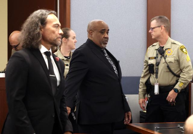 Duane Davis (C) and his attorney Michael Sanft are led back to a courtroom to hear his sentencing date after a jury found Davis guilty in the 1996 killing of rapper Tupac Shakur, at Clark County District Court at the Regional Justice Center in Las Vegas, Nevada, on August 31, 2026. Duane Davis, a former Los Angeles gang member, was found guilty on August 31 by a Las Vegas court of the 1996 murder of rapper Tupac Shakur. Thirty years after the rap legend's death at a Las Vegas casino, the jury found Davis, 63, guilty of murder after just a few hours of deliberation. (Photo by Bizuayehu TESFAYE / POOL / AFP)