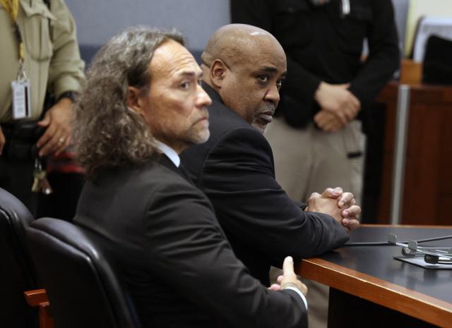 Duane Davis (R) and his attorney Michael Sanft sit in a courtroom after a jury found Davis guilty in the 1996 killing of rapper Tupac Shakur, at Clark County District Court at the Regional Justice Center in Las Vegas, Nevada, on August 31, 2026. Duane Davis, a former Los Angeles gang member, was found guilty on August 31 by a Las Vegas court of the 1996 murder of rapper Tupac Shakur. Thirty years after the rap legend's death at a Las Vegas casino, the jury found Davis, 63, guilty of murder after just a few hours of deliberation. (Photo by Bizuayehu TESFAYE / POOL / AFP)