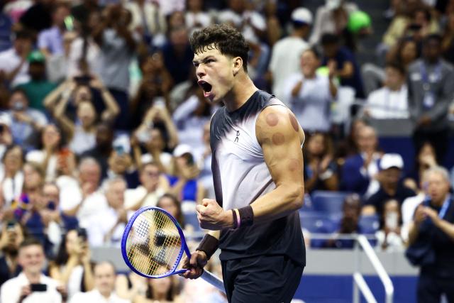 USA's Ben Shelton reacts after winning his match against Netherlands' Tallon Griekspoor (off frame) during the men's singles first round tennis match on day two of the US Open tennis tournament at the USTA Billie Jean King National Tennis Center in New York City on August 31, 2026. (Photo by CHARLY TRIBALLEAU / AFP)