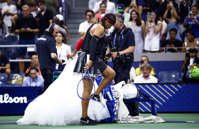Japan's Naomi Osaka warms up ahead of the women's singles first round tennis match against Russia's Anastasia Zakharova day two of the US Open tennis tournament at the USTA Billie Jean King National Tennis Center in New York City on August 31, 2026. (Photo by CHARLY TRIBALLEAU / AFP)