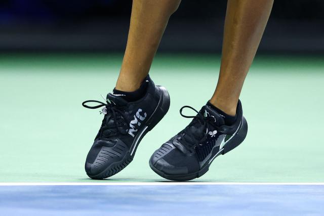 Japan's Naomi Osaka (detail shoes) returns the ball to Russia's Anastasia Zakharova (off frame) during the women's singles first round tennis match on day two of the US Open tennis tournament at the USTA Billie Jean King National Tennis Center in New York City on August 31, 2026. (Photo by CHARLY TRIBALLEAU / AFP)