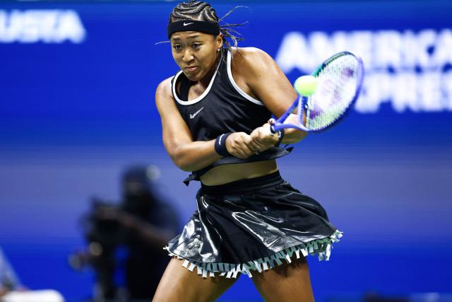 Japan's Naomi Osaka returns the ball to Russia's Anastasia Zakharova (off frame) during the women's singles first round tennis match on day two of the US Open tennis tournament at the USTA Billie Jean King National Tennis Center in New York City on August 31, 2026. (Photo by CHARLY TRIBALLEAU / AFP)
