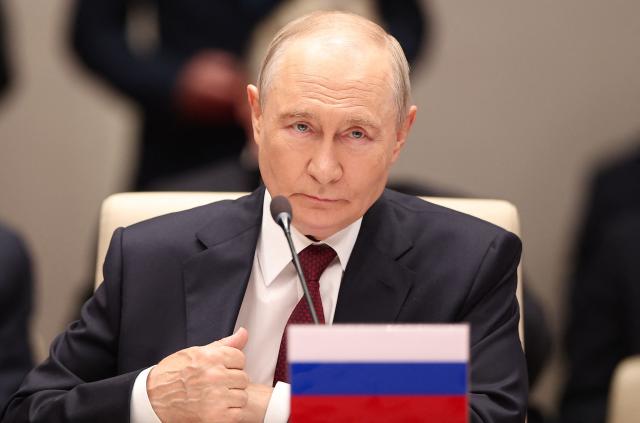 In this pool photograph distributed by the Russian state agency Sputnik, Russia's President Vladimir Putin attends the Shanghai Cooperation Organisation (SCO) summit in Bishkek on September 1, 2026. (Photo by Peter KOVALEV / POOL / AFP)