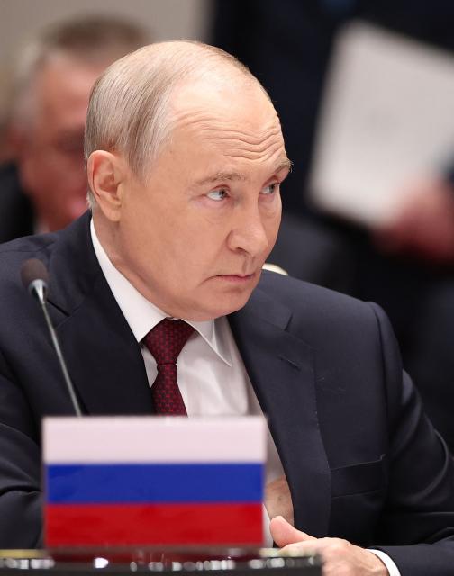In this pool photograph distributed by the Russian state agency Sputnik, Russia's President Vladimir Putin attends the Shanghai Cooperation Organisation (SCO) summit in Bishkek on September 1, 2026. (Photo by Peter KOVALEV / POOL / AFP)
