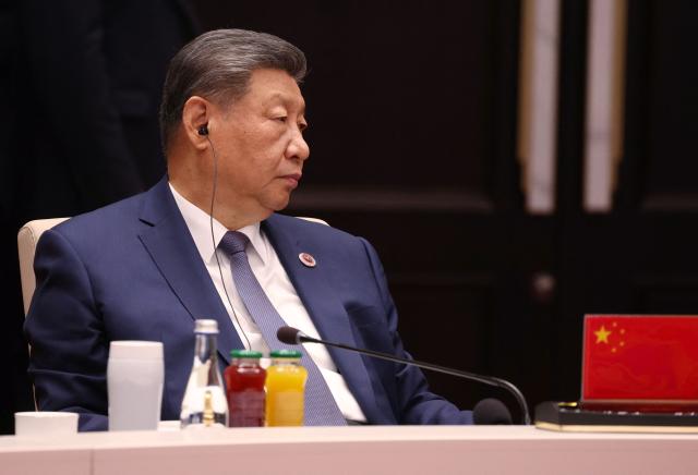 In this pool photograph distributed by the Russian state agency Sputnik, China's President Xi Jinping attends the Shanghai Cooperation Organisation (SCO) summit in Bishkek on September 1, 2026. (Photo by Vyacheslav PROKOFYEV / POOL / AFP)