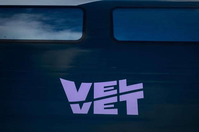 (FILES) The logo of Velvet is pictured on the side of the company's double-deck Avelia Horizon high-speed train at the Alstom plant in Aytrй, near La Rochelle, south-western France, on April 16, 2026. Private rail operator Velvet has been granted its operating licence for the French rail network, the company announced on September 1, 2026. Velvet aims to compete with French state rail operator SNCF starting 2028 on four high-speed routes in the west of the country (Paris–Bordeaux, Paris–Nantes, Paris–Angers and Paris–Rennes). (Photo by Philippe LOPEZ / AFP)