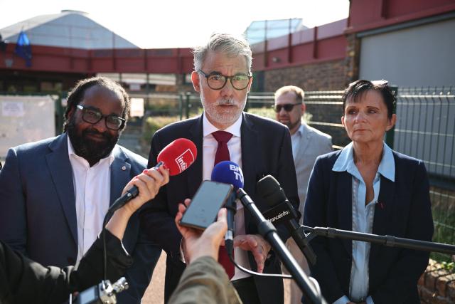 Candidate for France’s 2027 presidential election for the left-wing Socialist party (PS) and First secretary Olivier Faure speaks to press as he visits the primary school Les Ormes in Savigny-le-Temple, outside Paris, on September 1, 2026. Pupils in France are due to return to school on September 1, 2026 for the start of the new academic year. (Photo by SIMON WOHLFAHRT / AFP)