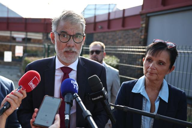 Candidate for France’s 2027 presidential election for the left-wing Socialist party (PS) and First secretary Olivier Faure speaks to press as he visits the primary school Les Ormes in Savigny-le-Temple, outside Paris, on September 1, 2026. Pupils in France are due to return to school on September 1, 2026 for the start of the new academic year. (Photo by SIMON WOHLFAHRT / AFP)