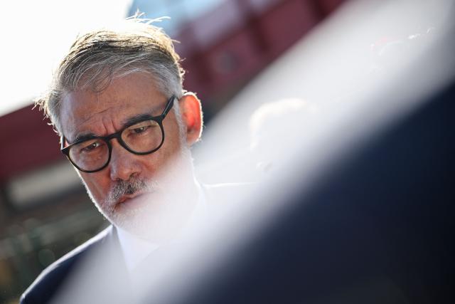 Candidate for France’s 2027 presidential election for the left-wing Socialist party (PS) and First secretary Olivier Faure speaks to press as he visits the primary school Les Ormes in Savigny-le-Temple, outside Paris, on September 1, 2026. Pupils in France are due to return to school on September 1, 2026 for the start of the new academic year. (Photo by SIMON WOHLFAHRT / AFP)