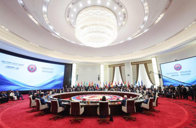 In this pool photograph distributed by the Russian state agency Sputnik, leaders attend a SCO+ format meeting of the Shanghai Cooperation Organisation (SCO) summit in Bishkek on September 1, 2026. (Photo by Vyacheslav PROKOFYEV / POOL / AFP)
