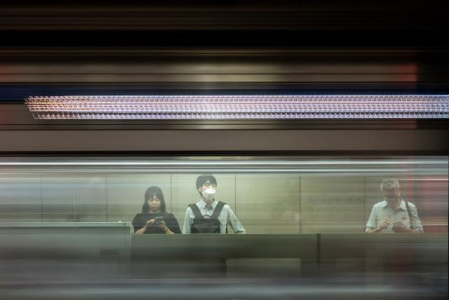 People wait for the train at Shimbashi metro station in Tokyo on September 1, 2026. (Photo by Philip FONG / AFP)