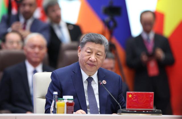 In this pool photograph distributed by the Russian state agency Sputnik, China's President Xi Jinping attends a SCO+ format meeting of the Shanghai Cooperation Organisation (SCO) summit in Bishkek on September 1, 2026. (Photo by Peter KOVALEV / POOL / AFP)