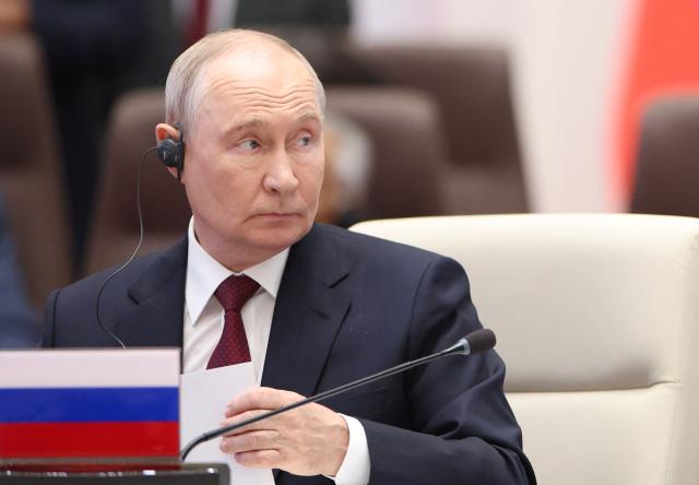 In this pool photograph distributed by the Russian state agency Sputnik, Russia's President Vladimir Putin attends a SCO+ format meeting of the Shanghai Cooperation Organisation (SCO) summit in Bishkek on September 1, 2026. (Photo by Peter KOVALEV / POOL / AFP)
