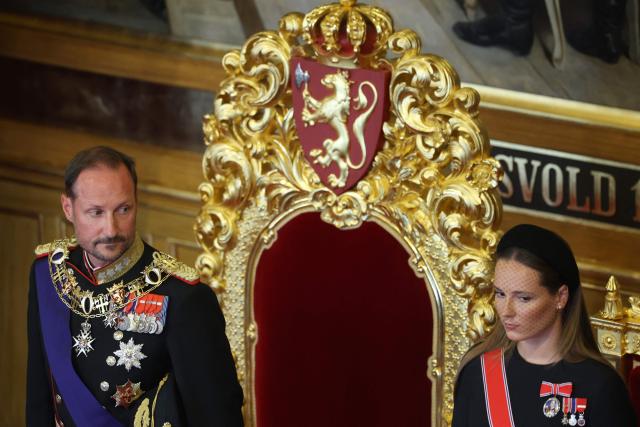 Crown Princess Ingrid Alexandra of Norway (R) stands next to her father King Haakon VIII of Norway during an oath-taking ceremony for the new king to Norway's constitution in the main chamber of the Norwegian Parliament, the Storting, in Oslo on September 1, 2026. (Photo by Odd ANDERSEN / AFP)