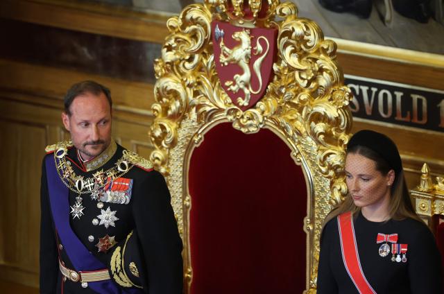 Crown Princess Ingrid Alexandra of Norway (R) stands next to her father King Haakon VIII of Norway during an oath-taking ceremony for the new king to Norway's constitution in the main chamber of the Norwegian Parliament, the Storting, in Oslo on September 1, 2026. (Photo by Odd ANDERSEN / AFP)