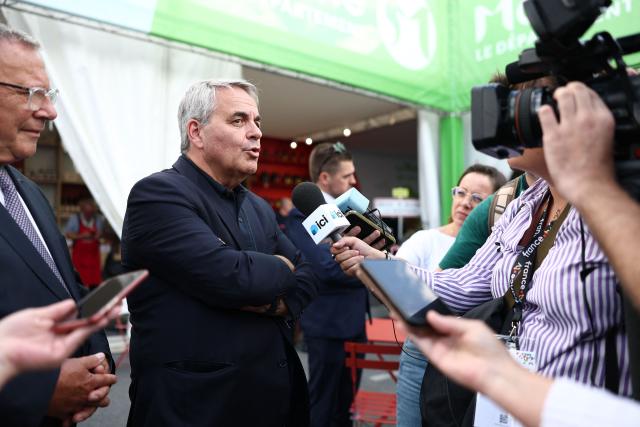 Hauts-de-France Regional Council President for Les Republicains (LR) party, Xavier Bertrand talks to the press during his visit to the agricultural fair in Chalons-en-Champagne, northeastern France on September 1, 2026. (Photo by Sameer AL-DOUMY / AFP)