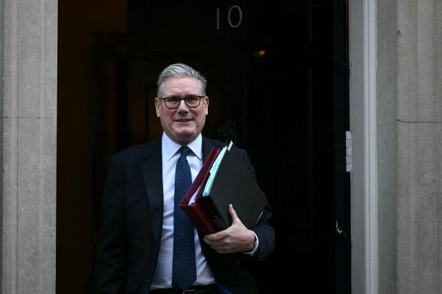 (FILES) Britain's Prime Minister Keir Starmer leaves 10 Downing Street in central London on January 14, 2026, to take part in the weekly session of 'Prime Minister's Questions' (PMQs). Britain's former prime minister Keir Starmer, who stepped down as leader this summer after a tumultuous two years in power, announced Monday, September 1, he would quit parliament to focus on "international affairs". (Photo by JUSTIN TALLIS / AFP)