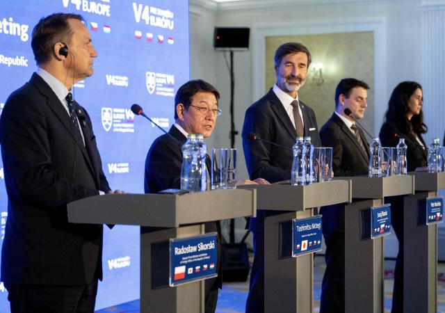 Foreign Ministers (L-R) Radoslaw Sikorski from Poland, Toshimitsu Motegi from Japan, Juraj Blanar from Slovakia, Petr Macinka from the Czech Republic and Anita Orban from Hungary attend their press conference during the Visegrad Group (V4) and Japan (V4+Japan) foreign ministers' meeting in Tomasov near Bratislava, Slovakia, on September 1, 2026.  (Photo by Joe Klamar / AFP)